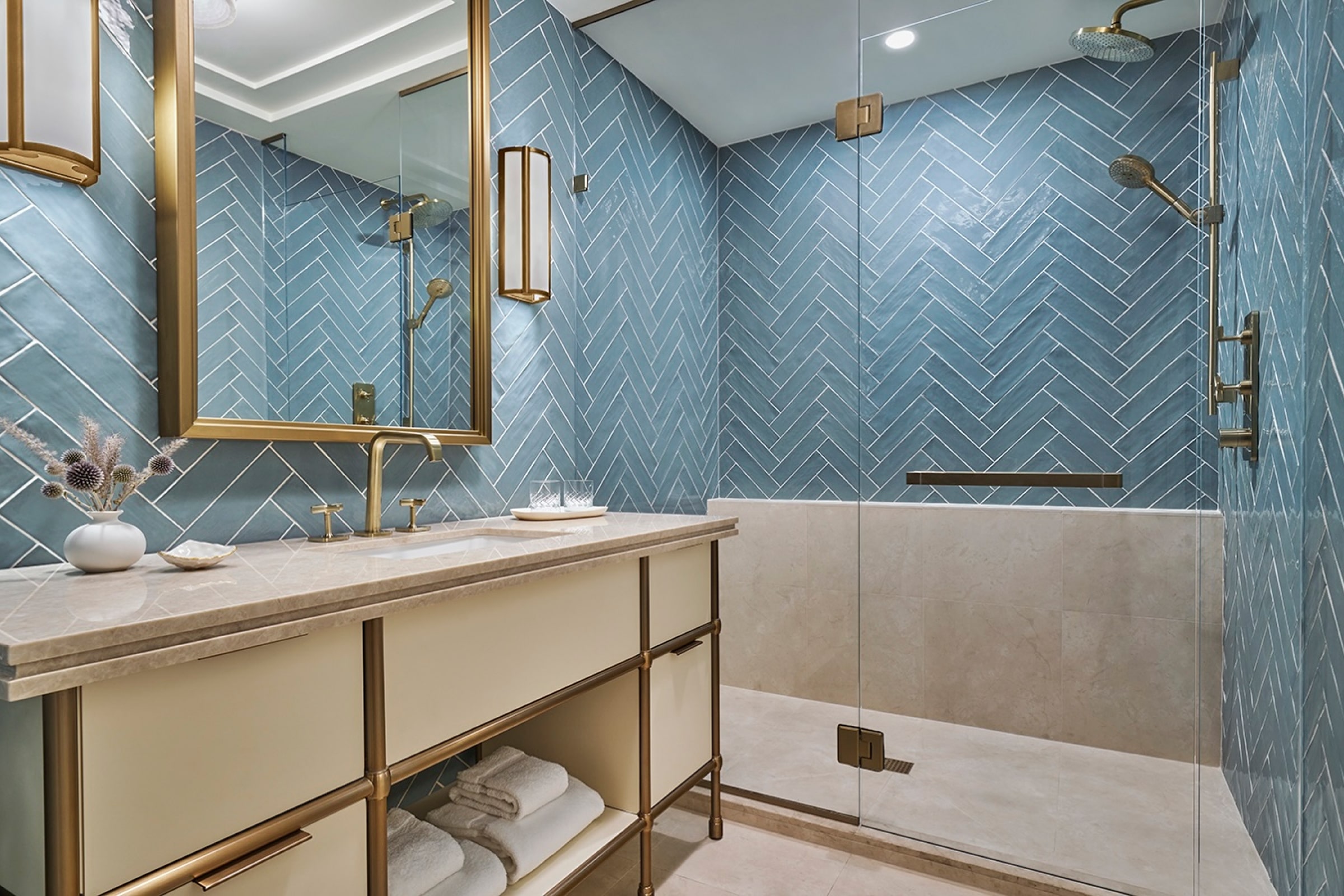 this image depicts a bathroom with blue tile