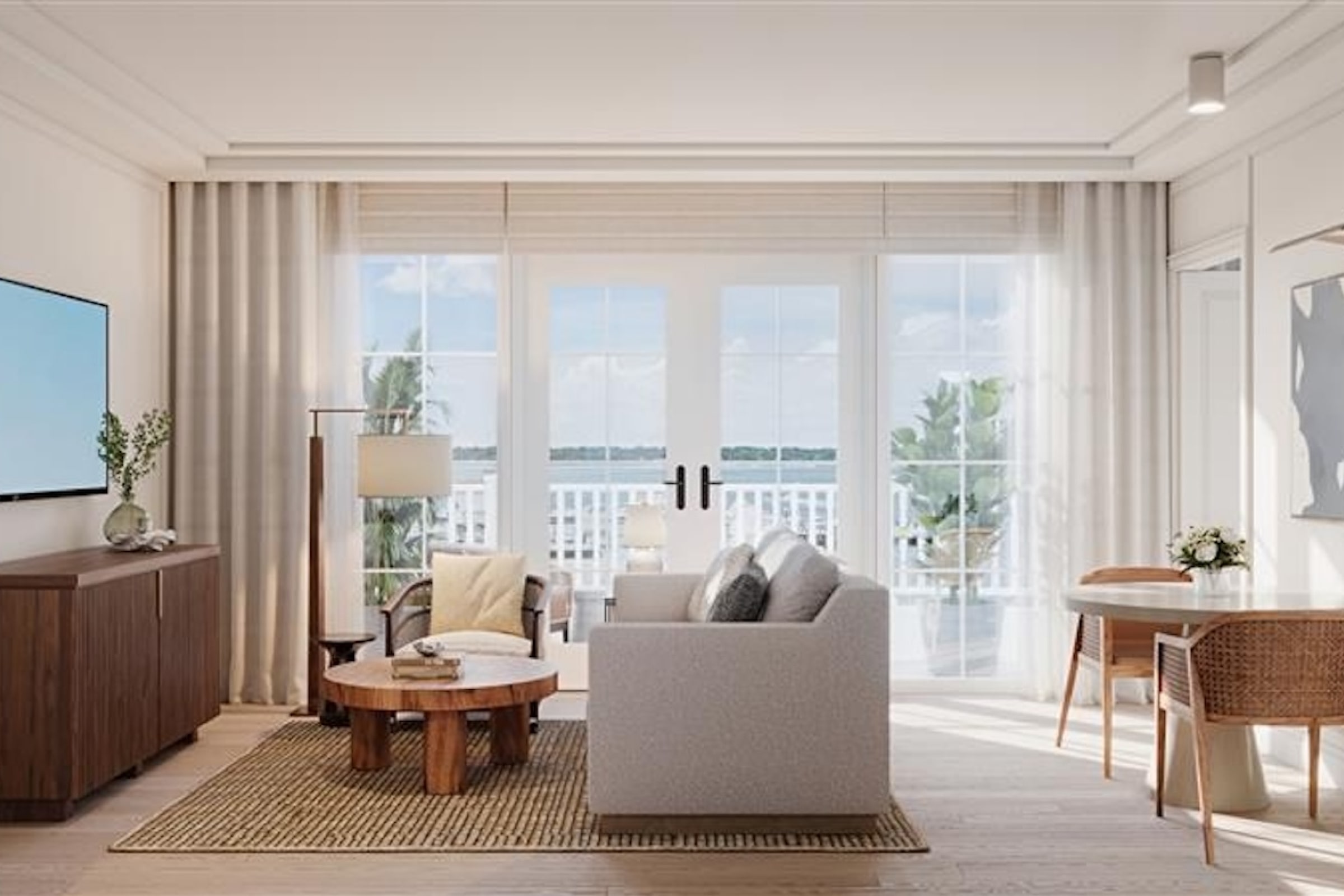 this image depicts a hotel room on a sunny day with water outside